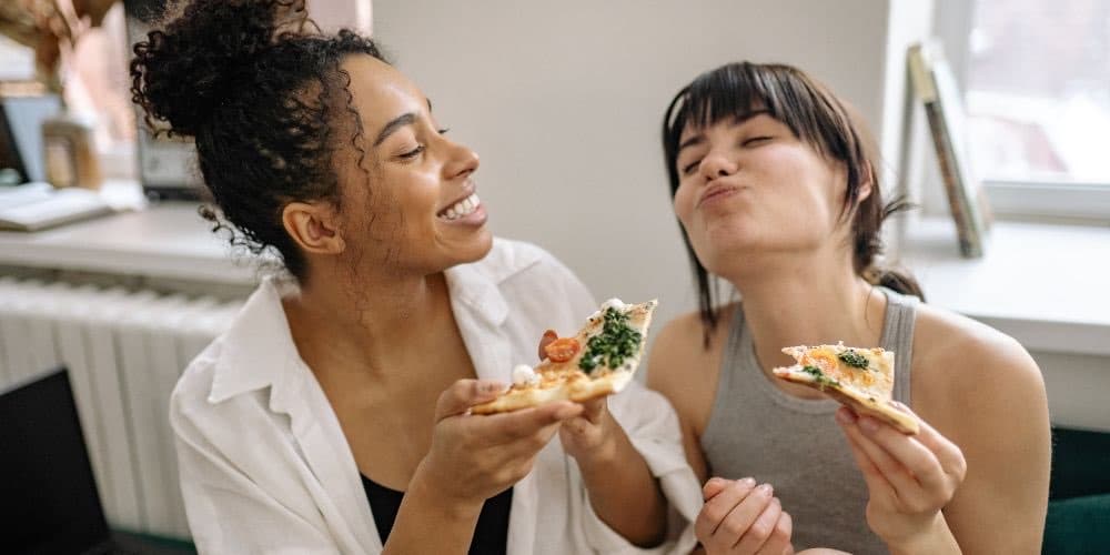 Two people enjoying healthy food